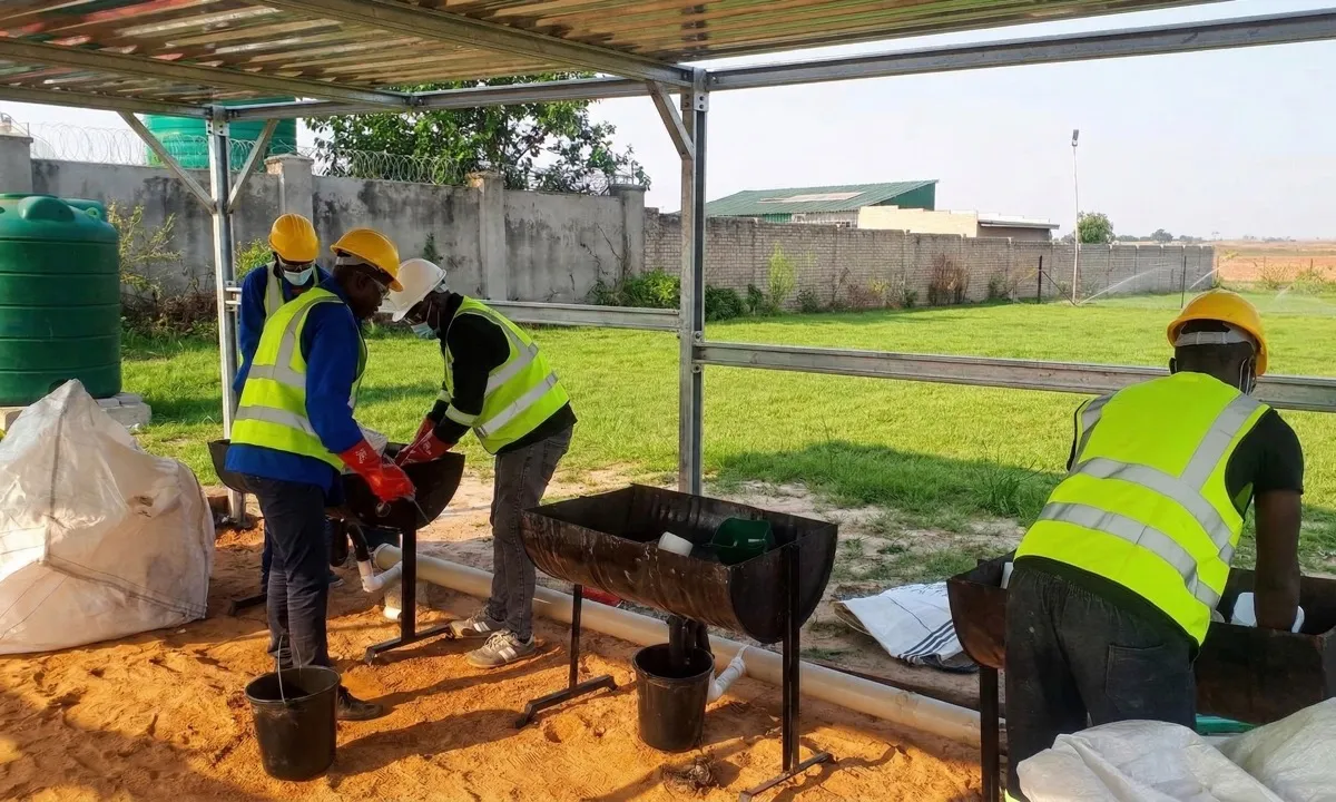 WasteMate team at temporary waste processing site